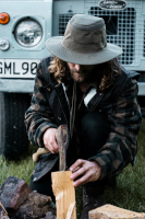Man with Hat, chopping wood